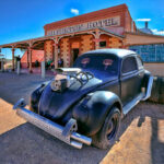 Hot rod in front of Silverton Hotel, Silverton, New South Wales, Australia. (Photo by: Auscape/Universal Images Group via Getty Images)